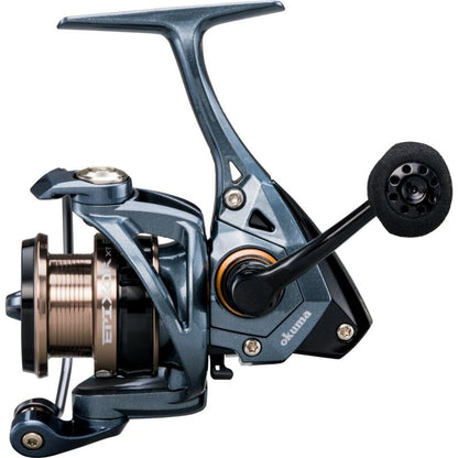 OKUMA Epixor XT Spin 55 fishing reel with sleek metallic design, ergonomic handle, and durable construction for freshwater and saltwater fishing.